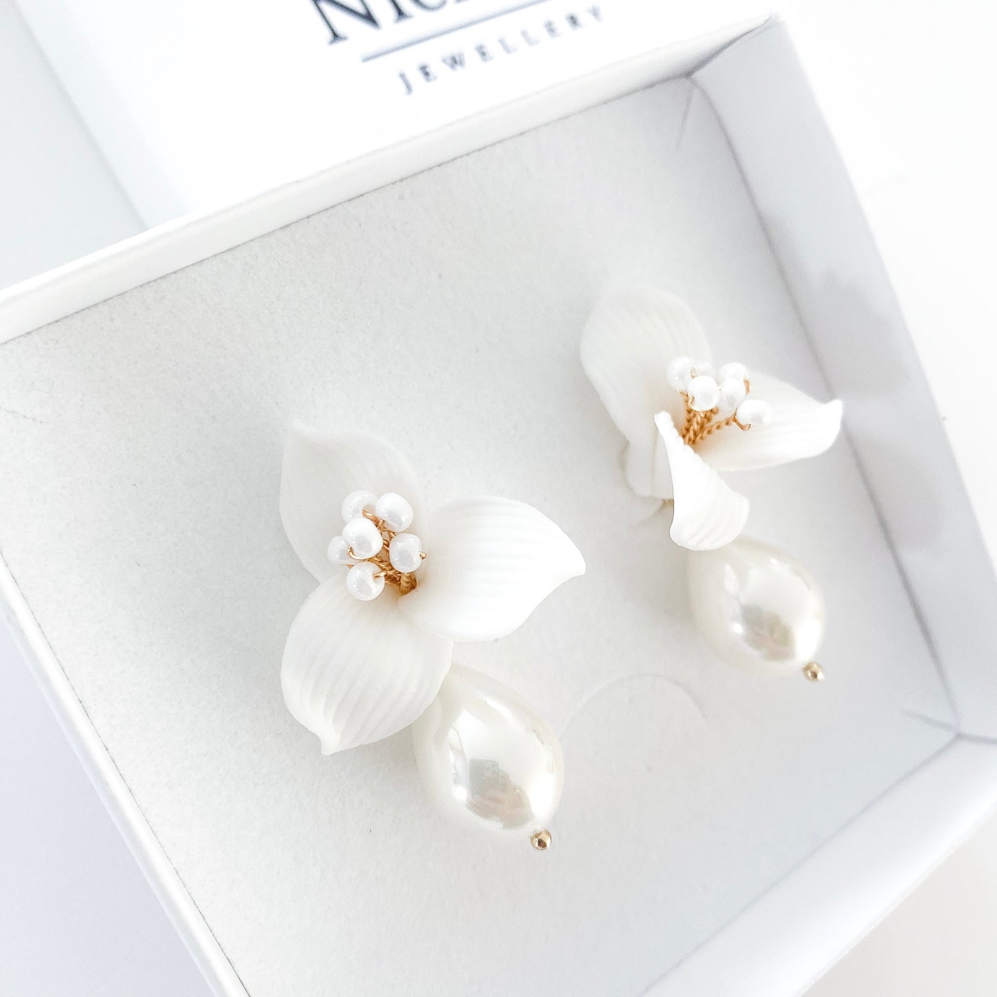 Pretty porcelain 3 petal flower and teardrop pearl earrings