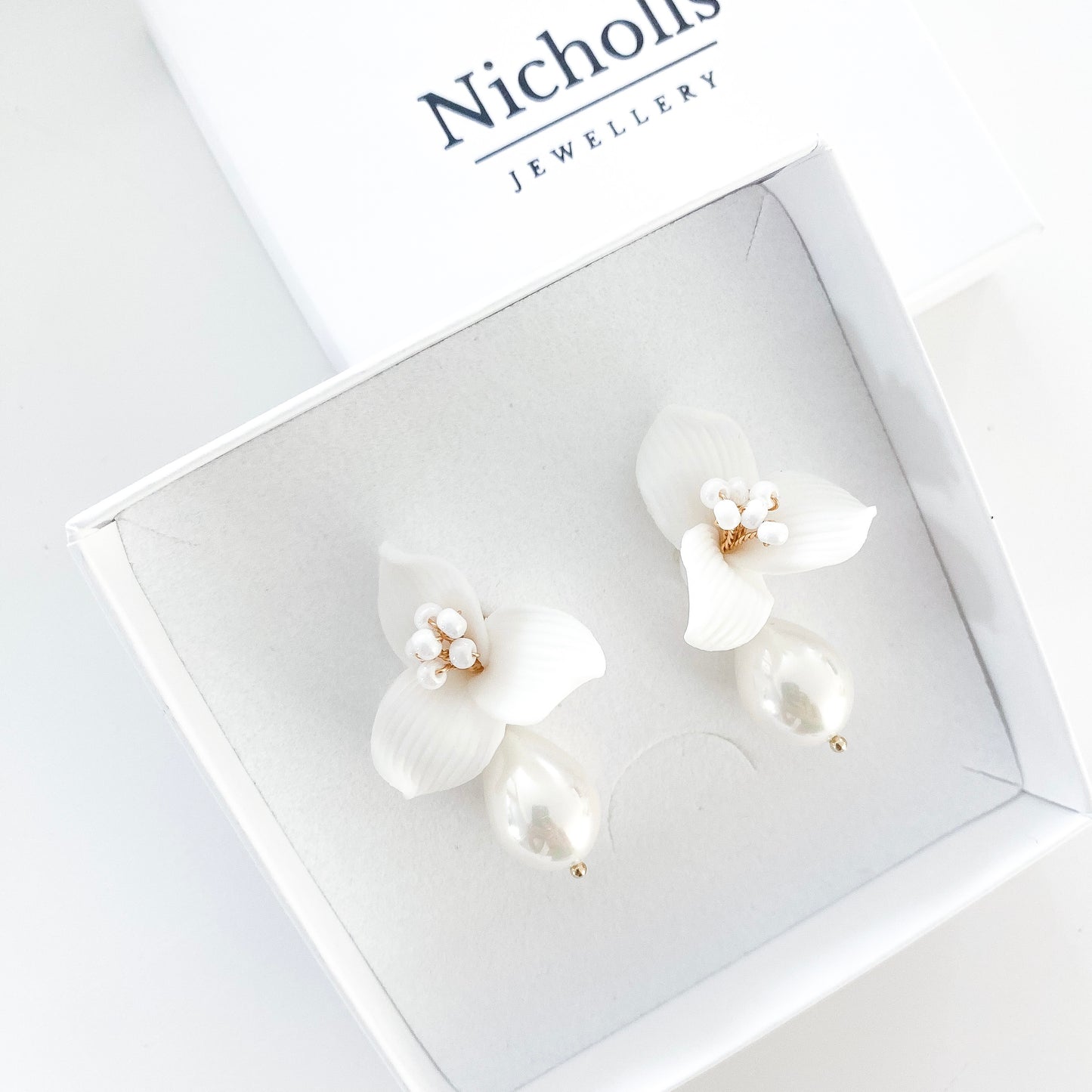 Pretty porcelain 3 petal flower and teardrop pearl earrings
