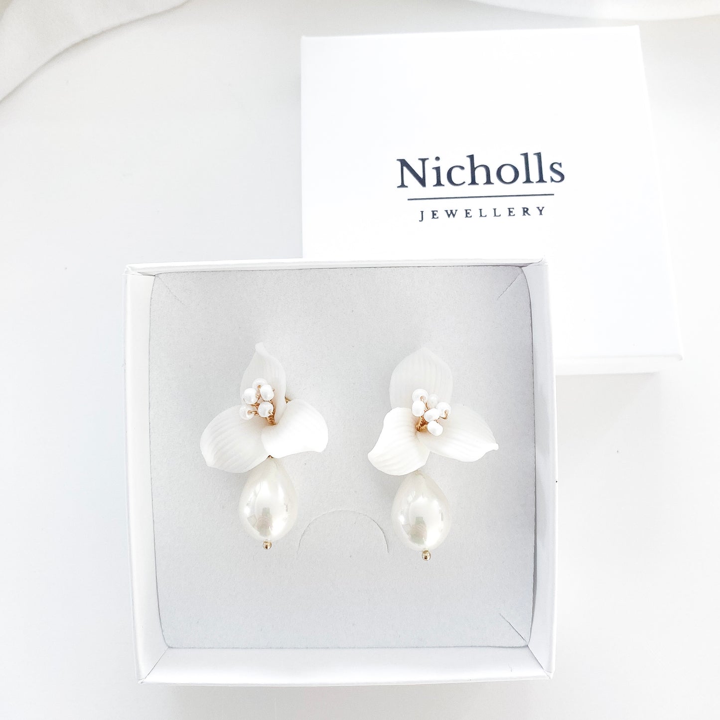 Pretty porcelain 3 petal flower and teardrop pearl earrings