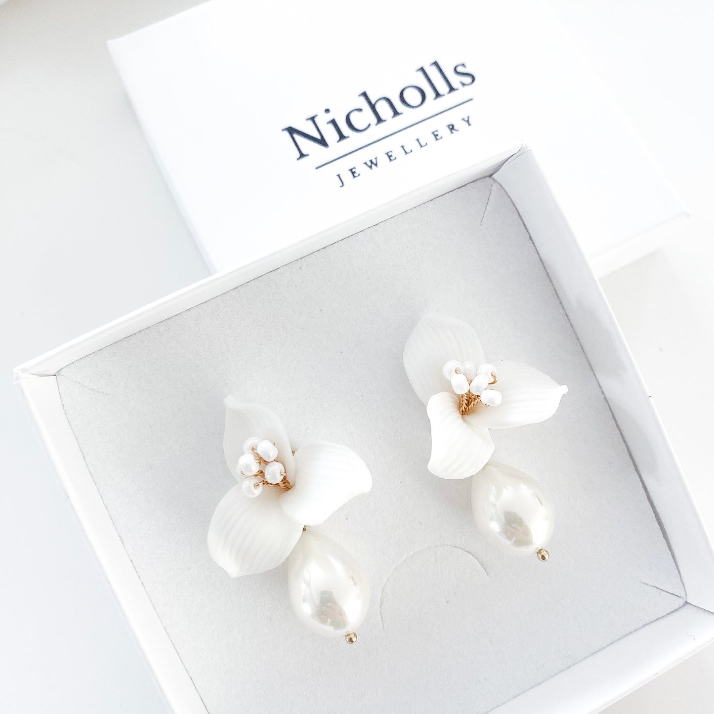 Pretty porcelain 3 petal flower and teardrop pearl earrings