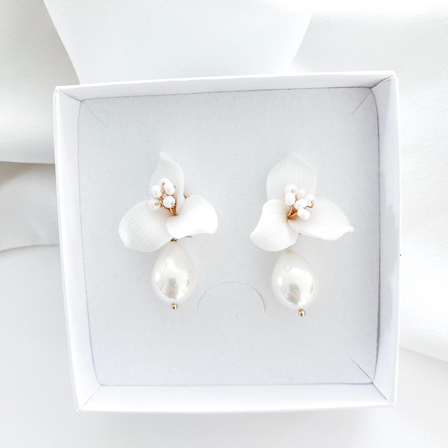 Pretty porcelain 3 petal flower and teardrop pearl earrings
