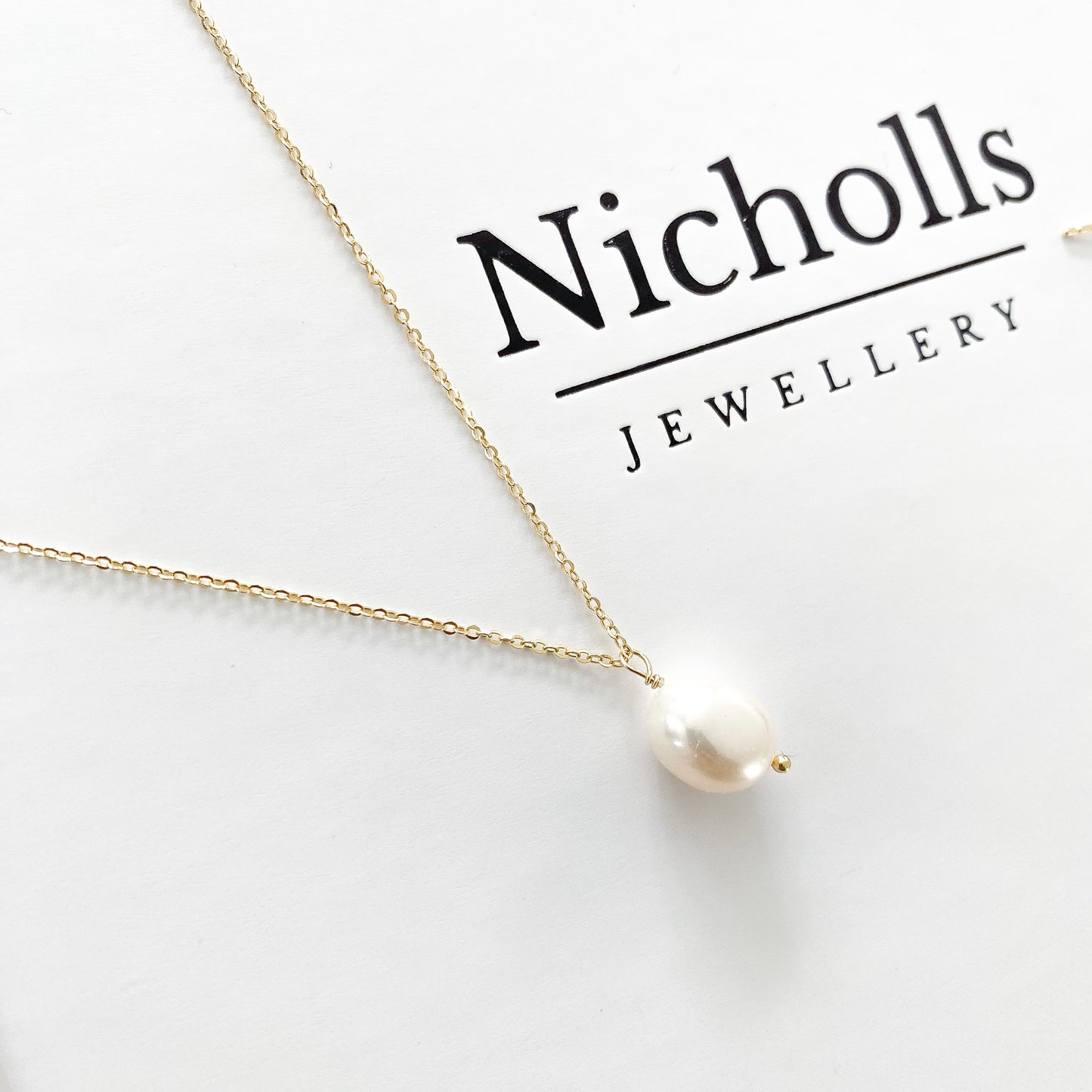 Delicate Pearl necklace and earring set in gold