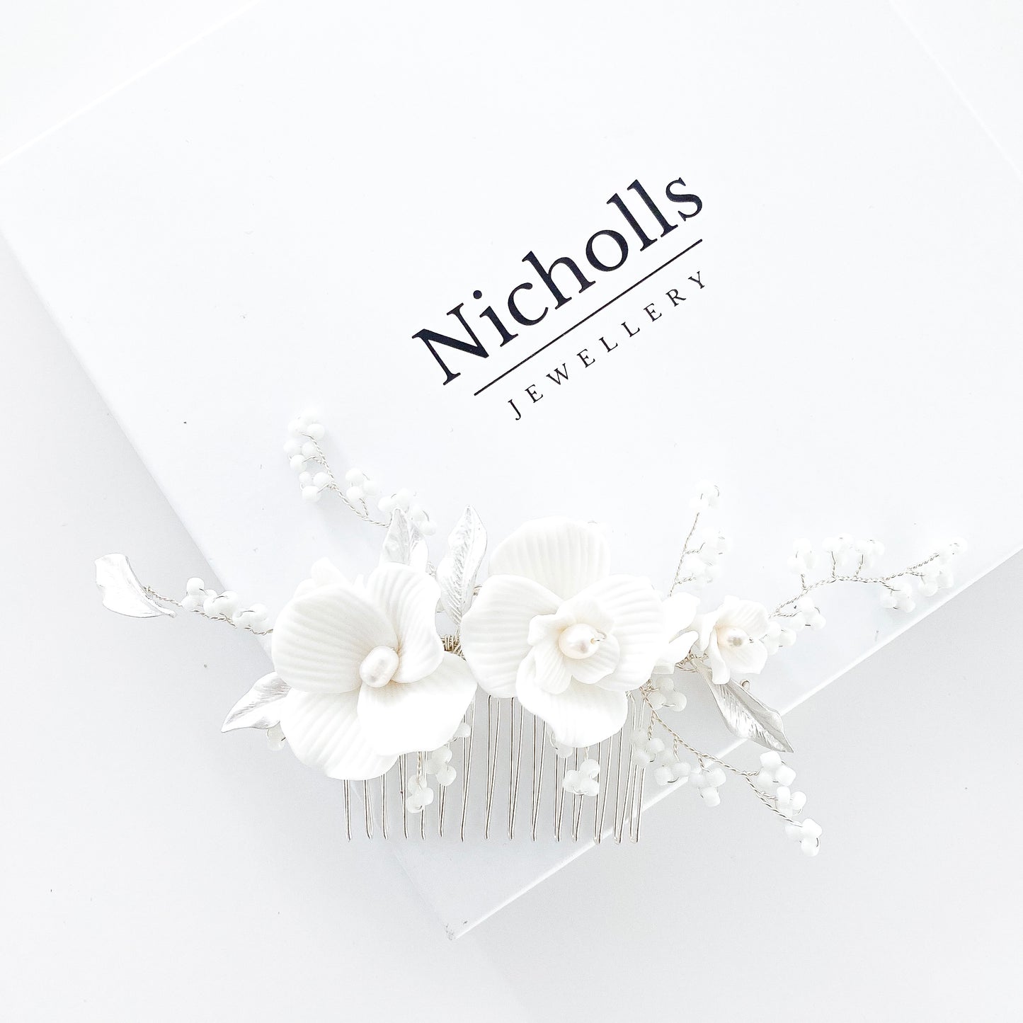Porcelain White Flower, Silver Leaf and Silver Comb