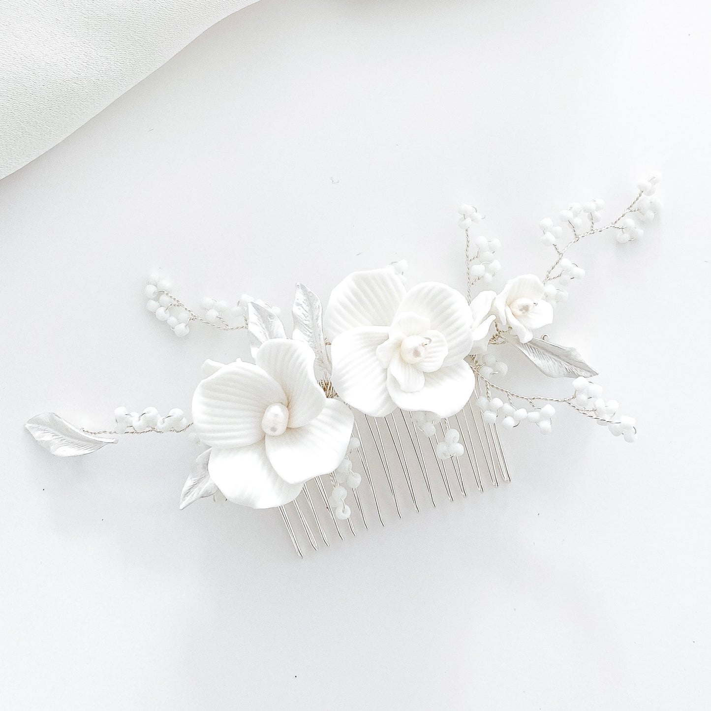 Porcelain White Flower, Silver Leaf and Silver Comb