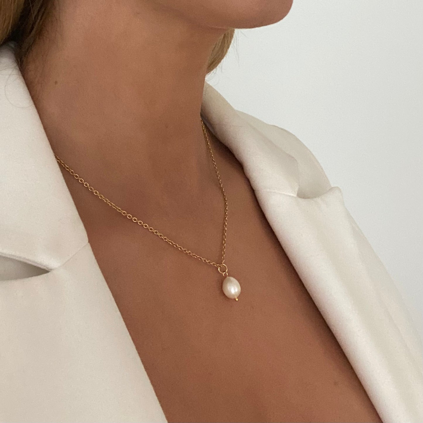 Delicate Pearl necklace and earring set in gold