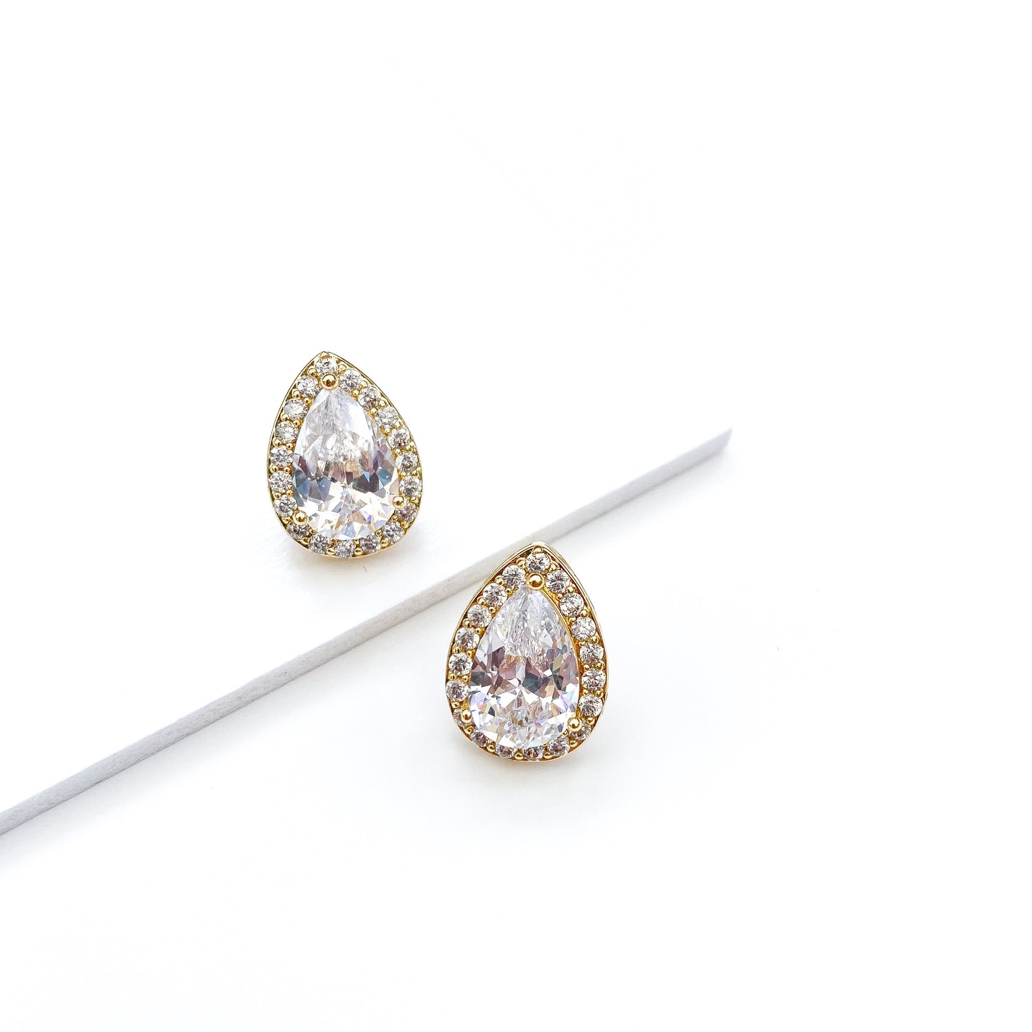 Trust Crystal Teardrop Gold Studs