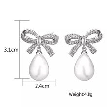 Load image into Gallery viewer, Crystal Bow &amp; Pearl Earrings Silver
